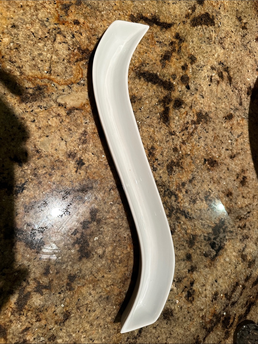 Crate & Barrel curved olive tray